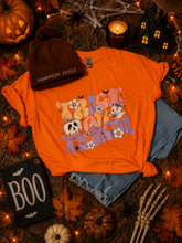 Load image into Gallery viewer, Trick or Teach Graphic Tee – Size Medium 🍎👻
