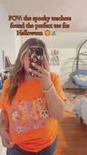 Load and play video in Gallery viewer, Trick or Teach Graphic Tee – Size Medium 🍎👻
